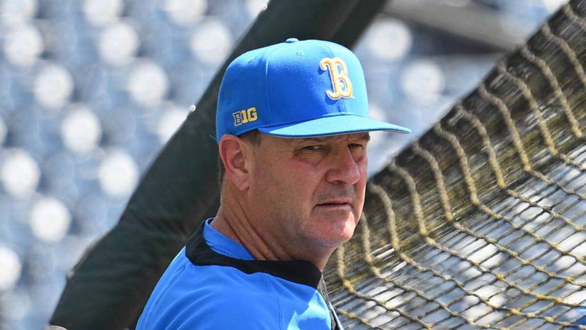  Jun 14, 2025; Omaha, Neb, USA; UCLA Bruins head coach John Savage watches the team warm up before the game against the Murray State Races at Charles Schwab Field. Mandatory Credit: Steven Branscombe-Imagn Images | Steven Branscombe-Imagn Images 