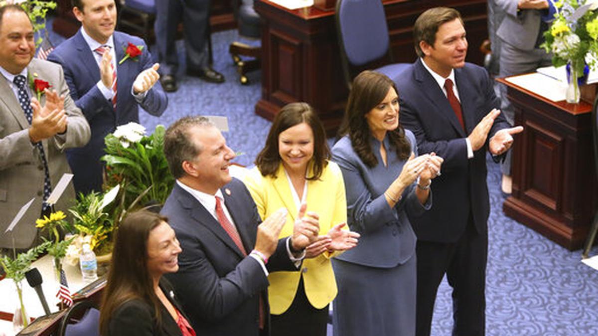 From left, Nikki Fried, commissioner of agriculture; Jimmy Patronis, chief financial officer; Ashley Moody, attorney general; Lt. Gov. Jeanette Nunez, and Gov. Ron Desantis are introduced to the house on the first day of legislative session Tuesday, March 5, 2019, in Tallahassee, Fla.