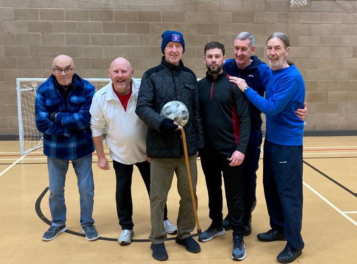  Hugh "Hughie" McIlmoyle at a walking football game. (Alan McIlmoyle via SWNS) 