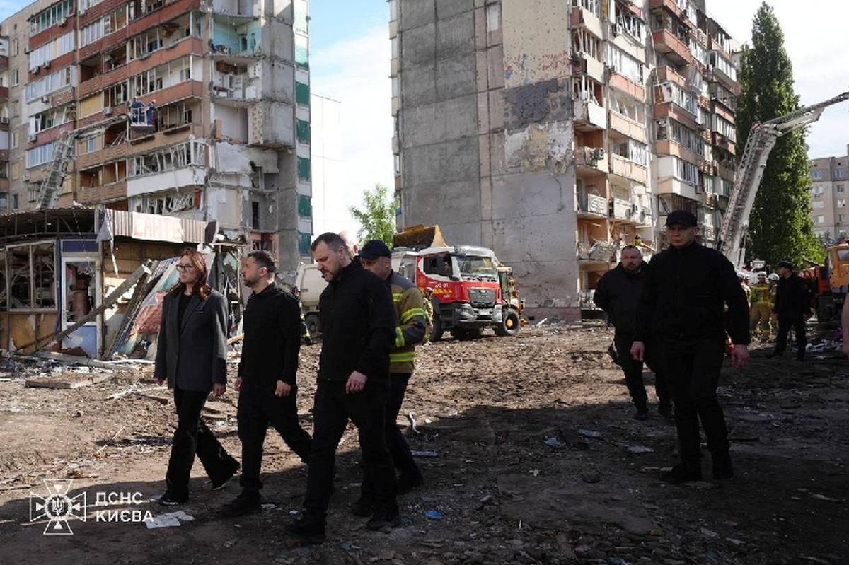 Ukraine's President Volodymyr Zelenskiy, Ukrainian Prime Minister Yulia Svyrydenko and Ukrainian Minister of Internal Affairs Ihor Klymenko visit the site of an apartment building damaged during yesterday's Russian missile and drone strike, amid Russia's attack on Ukraine, in Kyiv, Ukraine in this handout picture released May 15, 2026. Press service of the State Emergency Service of Ukraine in Kyiv/Handout via REUTERS