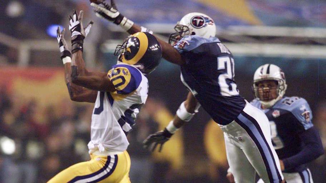  Tennessee Titans defensive back Samari Rolle, center, is reaching to knock away a pass to St. Louis Rams receiver Isaac Bruce (80) during the first quarter of Super Bowl XXXIV inside the Georgia Dome Jan. 30, 2000. Tennessee Titans Vs St Louis Rams In Super Bowl Xxxiv Football | George Walker IV / The Tennessean, Nashville Tennessean via Imagn Content Services, LLC 