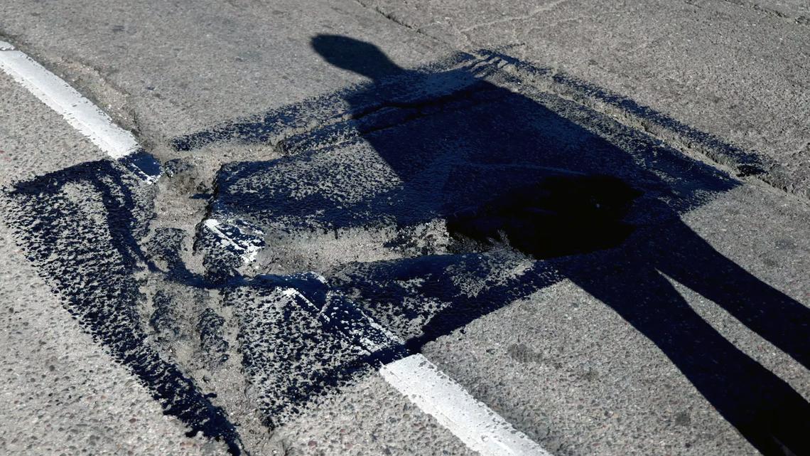 Commentary: Fix the potholes or fight the power? That's the choice facing California's next governor 