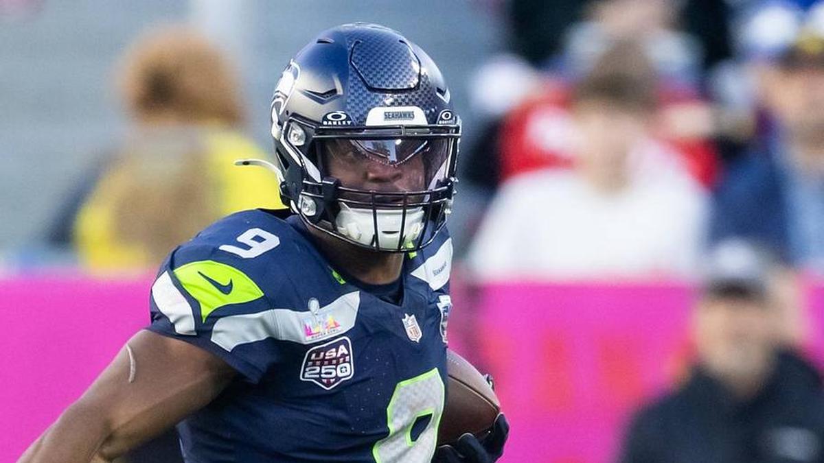  Feb 8, 2026; Santa Clara, CA, USA; Seattle Seahawks running back Kenneth Walker III (9) runs the ball against New England Patriots defensive end Milton Williams (97) during Super Bowl LX at Levi's Stadium. Mandatory Credit: Mark J. Rebilas-Imagn Images | Mark J. Rebilas-Imagn Images 