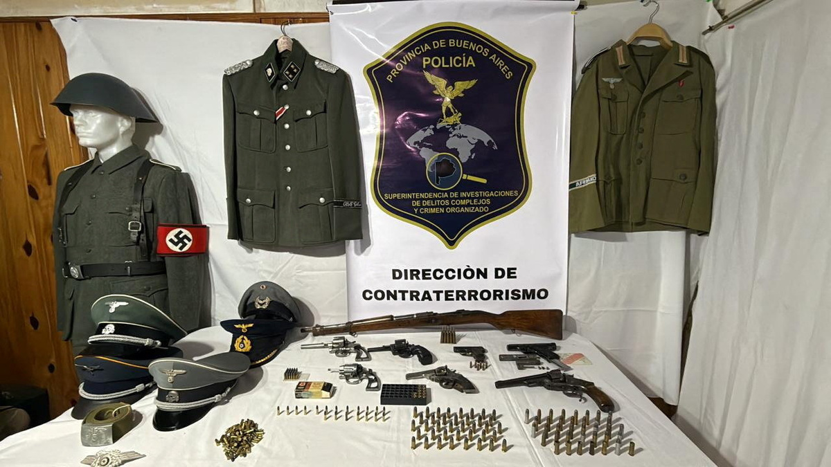 Nazi arsenal in this undated handout photo after Argentine police seized an arsenal of Nazi military uniforms, weapons, ammunition and accessories from a merchant in Buenos Aires province who was selling them online, according to a police statement, in Argentina. Policia de la Provincia de Buenos Aires/via REUTERS