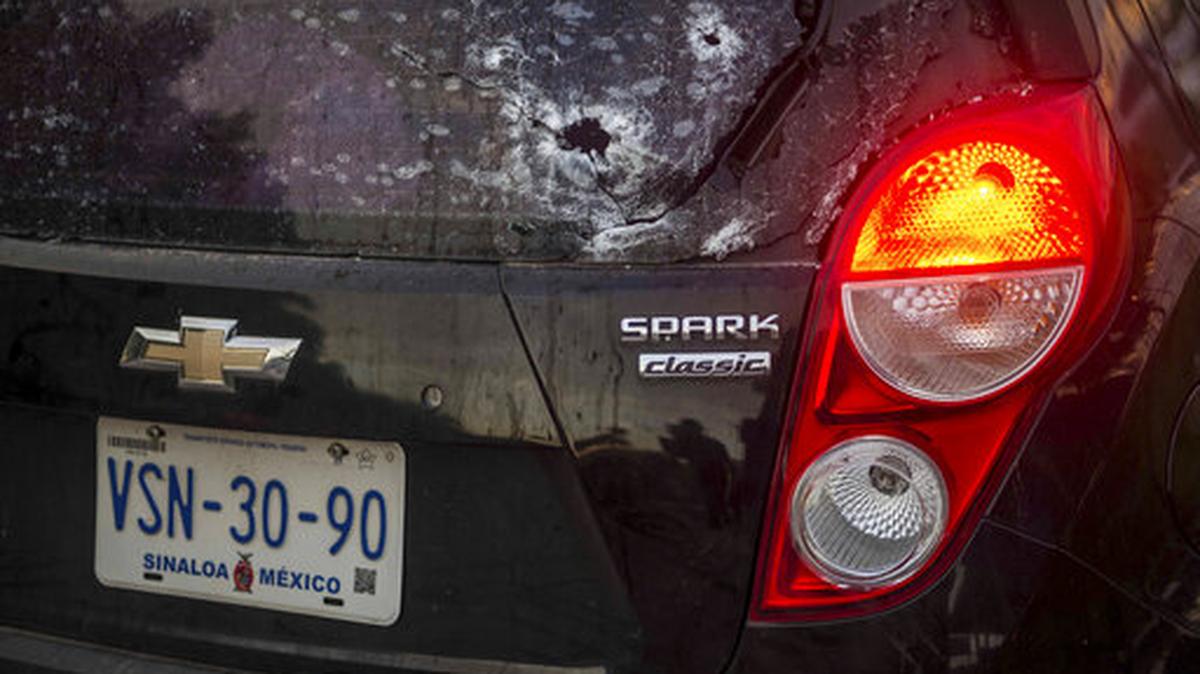 File photo of a car’s rear window that was pierced with bullet holes amid a gunfight in Culiacan, Mexico, in 2019.