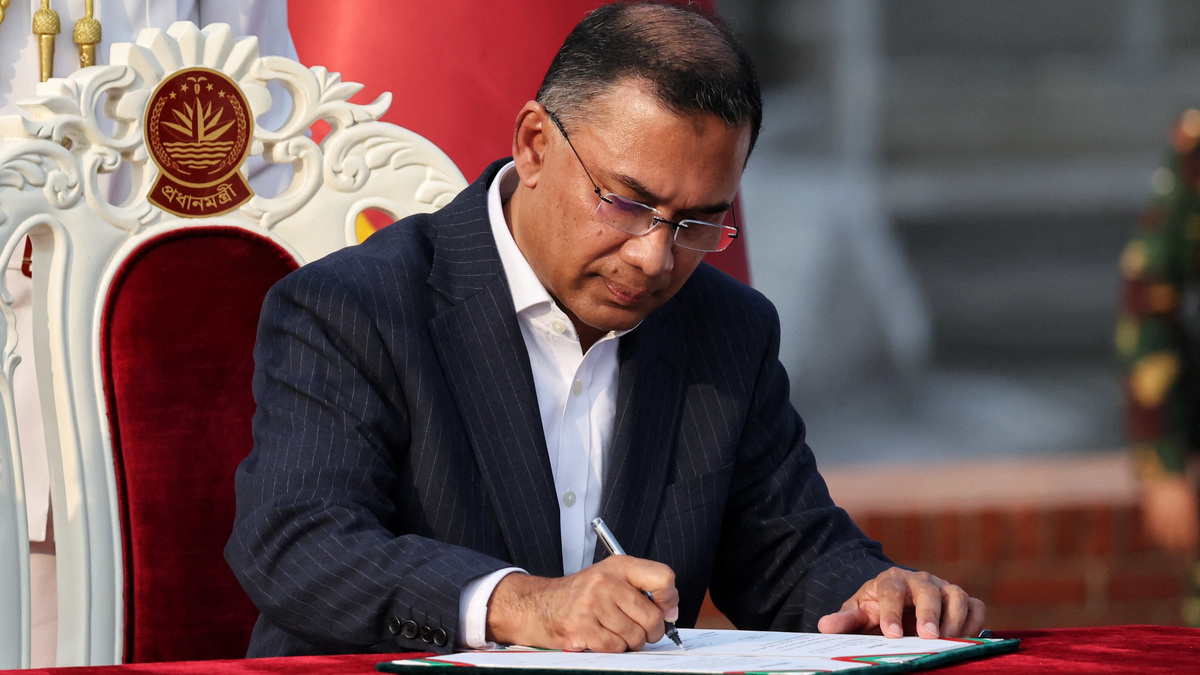 Tarique Rahman signs in as the new Prime Minister during an oath taking ceremony at the South Plaza of the parliament building, following BNP's landslide victory in the national polls, in Dhaka, Bangladesh, February 17, 2026. REUTERS/Mohammad Ponir Hossain/File Photo