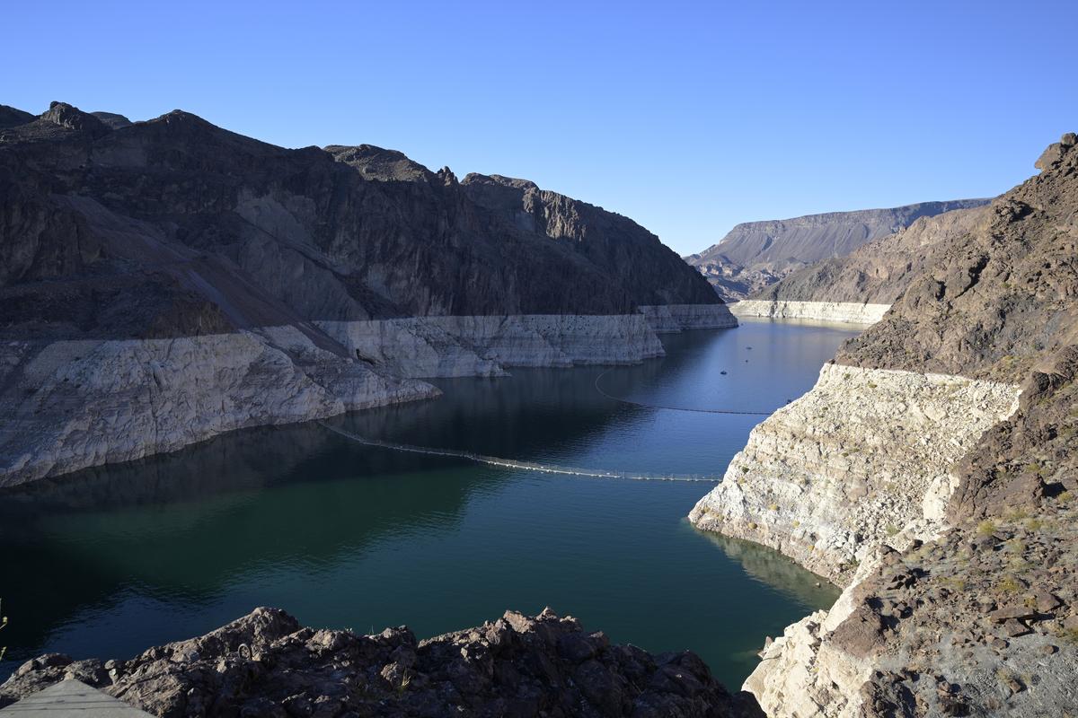  Low water levels expose rings of previous water lines of Lake Mead as viewed from the Arizona side of the Hoover Dam on July 15, 2023, near Boulder City, Nevada. 