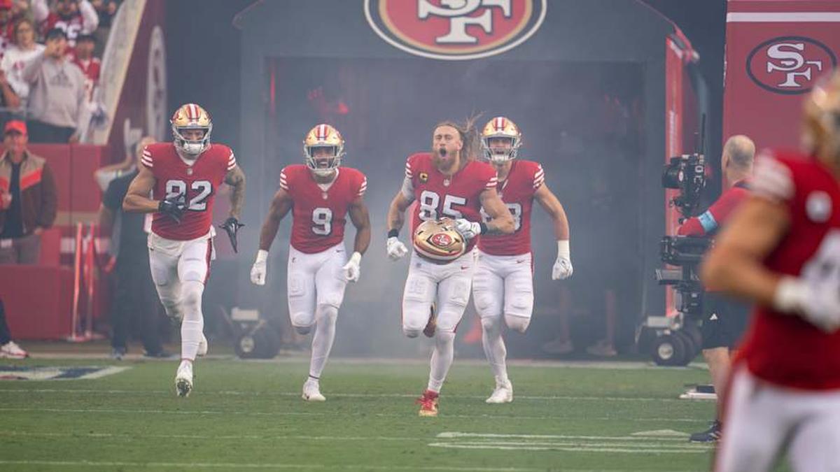  Oct 27, 2024; Santa Clara, California, USA; San Francisco 49ers tight end George Kittle (85) is introduced to the fans before the start of the game against the Dallas Cowboys at Levi's Stadium. Mandatory Credit: Neville E. Guard-Imagn Images | Neville E. Guard-Imagn Images 