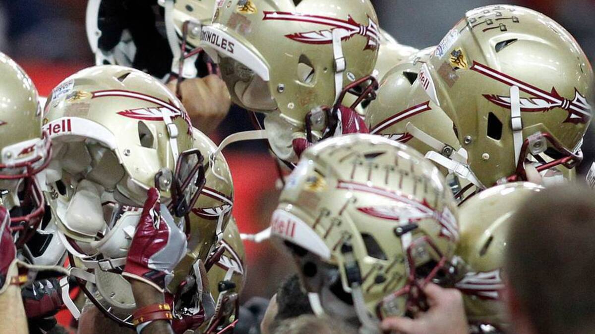  Dec 31, 2015; Atlanta, GA, USA; The Florida State Seminoles huddle prior to their game against the Houston Cougars in the 2015 Chick-fil-A Peach Bowl at the Georgia Dome. Mandatory Credit: Brett Davis-USA TODAY Sports | IMAGN IMAGES via Reuters Connect 