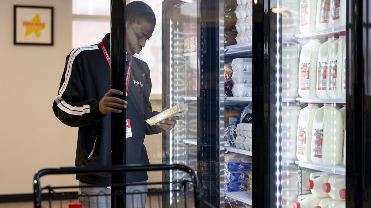 Kennedy-King College student Komla Kufe shops Wednesday, Feb. 4, 2026, at the Statesmen Market, an expanded on-campus food pantry in Chicago’s Englewood neighborhood. (Brian Cassella/Chicago Tribune/TNS)
