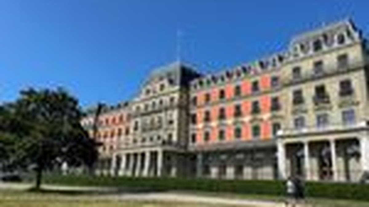 People walk past the Palais Wilson, base of the U.N. High Commissioner for Human Rights, and the former headquarters of the League of Nations, in Geneva, Switzerland, June 17, 2025. REUTERS/Emma Farge