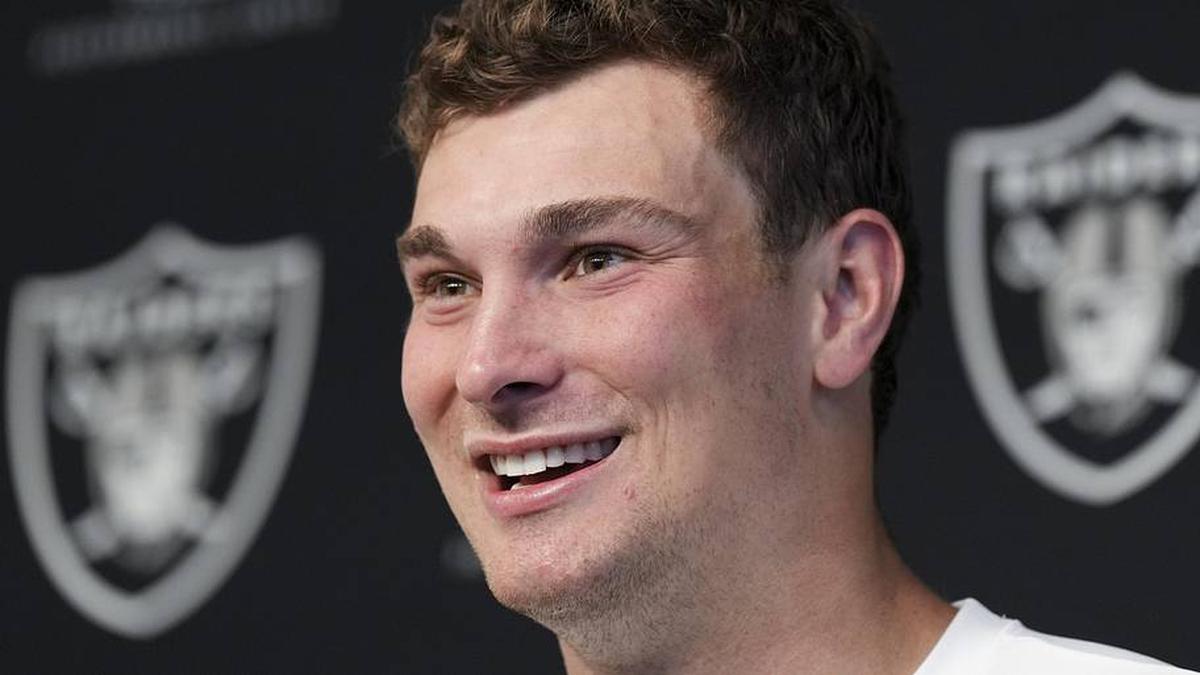  May 2, 2026; Henderson, NV, USA; Las Vegas Raiders quarterback Fernando Mendoza (15) speaks during a news conference at the team's Rookie Minicamp at Intermountain Health Performance Center. Mandatory Credit: Candice Ward-Imagn Images | Candice Ward-Imagn Images 