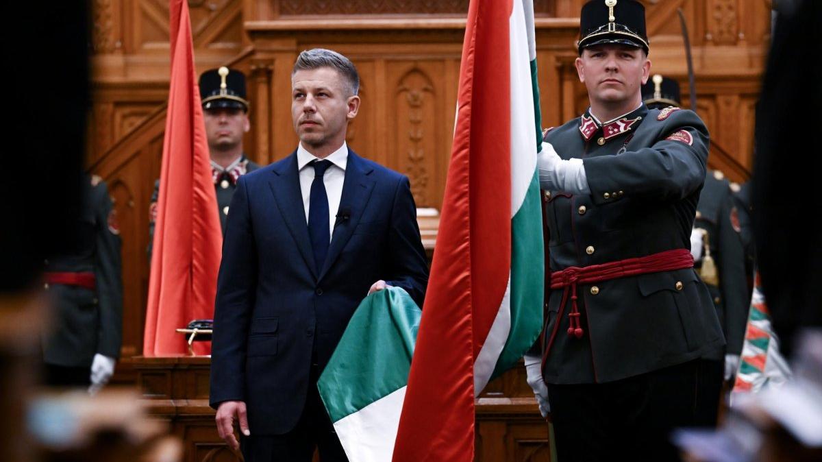 Peter Magyar, left, takes the oath of office as prime minister of Hungary during the inaugural session of the new National Assembly in Budapest, Hungary, Saturday. Photo by Tibor Illyes/EPA