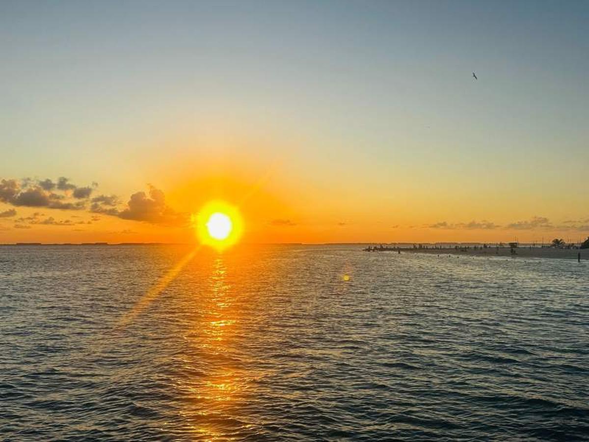  Watching the sun set over the Caribbean during a catamaran cruise to Isla Mujeres ended up being one of my favorite experiences during my stay at this Cancun all inclusive adults only resort. Photo credit: Shelly Peterson 