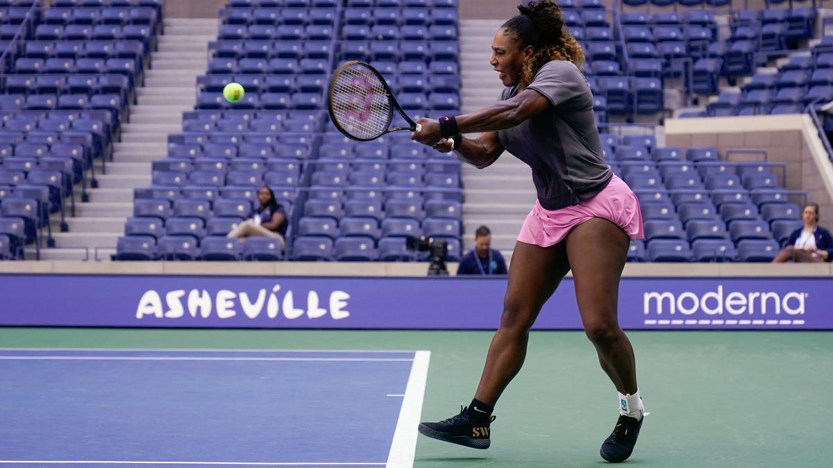 Serena Williams practices at Arthur Ashe Stadium before the start of the U.S. Open tennis tournament in New York, Thursday, Aug. 25, 2022. (AP Photo/Seth Wenig)