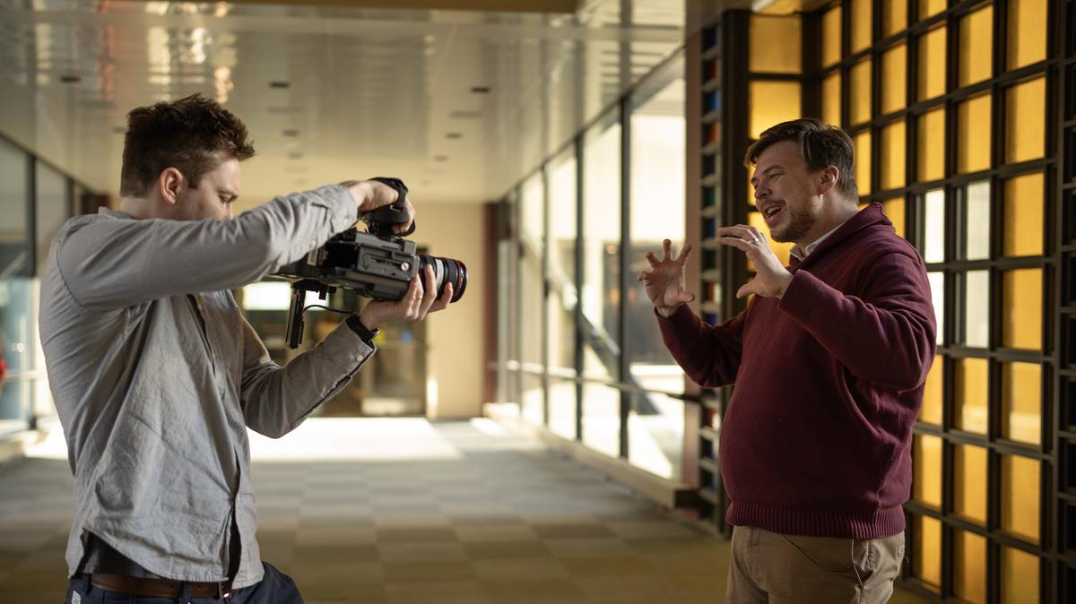Videographer Chris Parr filmed John O'Sullivan in a skyway in downtown Minneapolis on Tuesday Jan. 14, 2025, for their new series "The Hidden Middle." (Jerry Holt/The Minneosta Star Tribune/TNS)