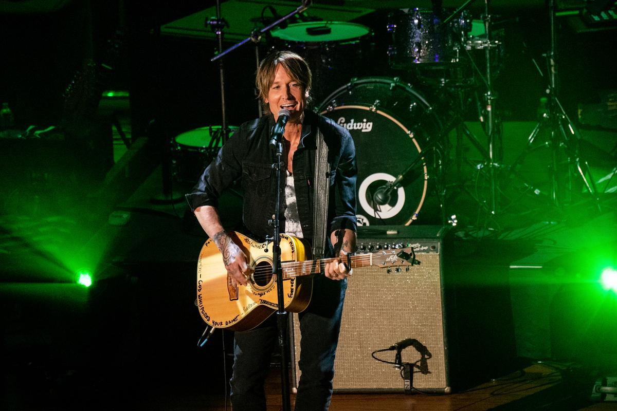 Keith Urban, seen at the Ryman Auditorium on Aug. 25, 2021, will perform at Coastal Credit Union Music Park at Walnut Creek on Aug. 13.