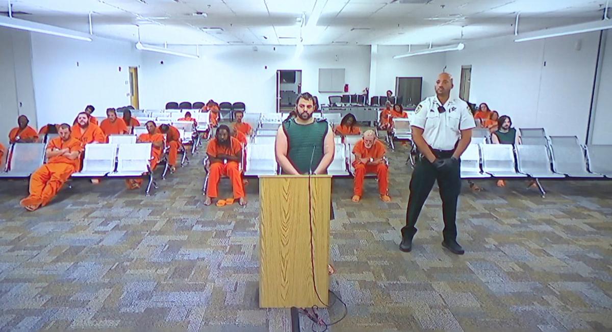  Hisham Abugharbieh, facing two counts of first-degree murder, appears in court via video on April 25, 2026, in Tampa, Florida. 