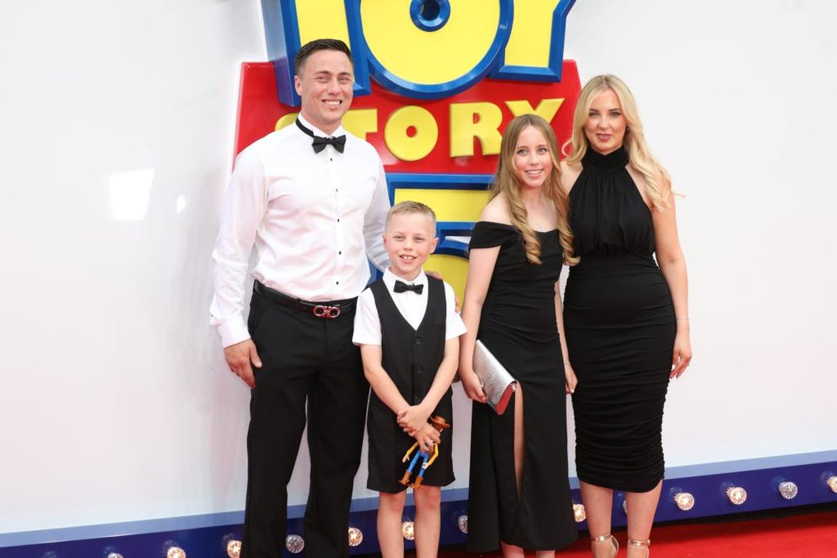  Little Vinny Donnelly and his family on the red carpet at the premiere of "Toy Story 5". (William Lailey via SWNS) 