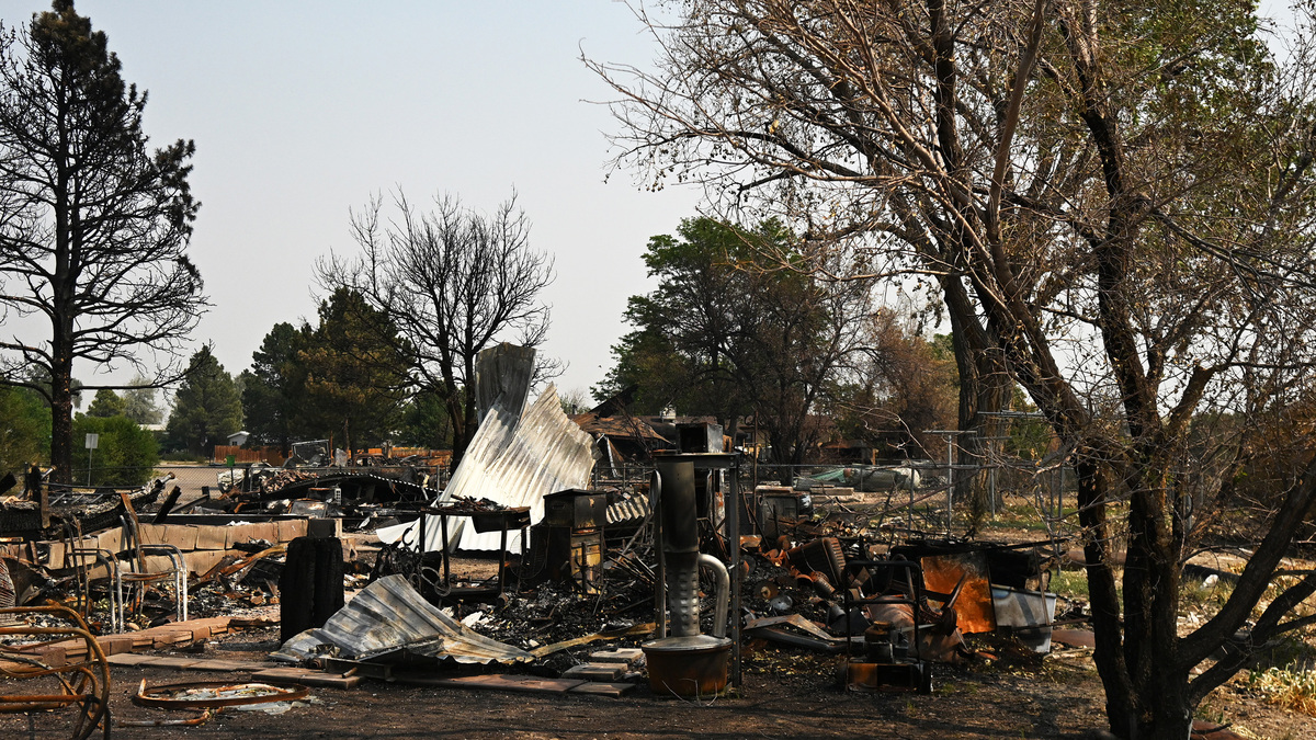 Homes and property at Mountain Shadows Mobile Estates were damaged by the heat and flames of the Aspen Acres Fire in recent days as the fire continued to burn on Monday, July 6, 2026, in Colorado City, Colorado. (RJ Sangosti/The Denver Post/TNS)