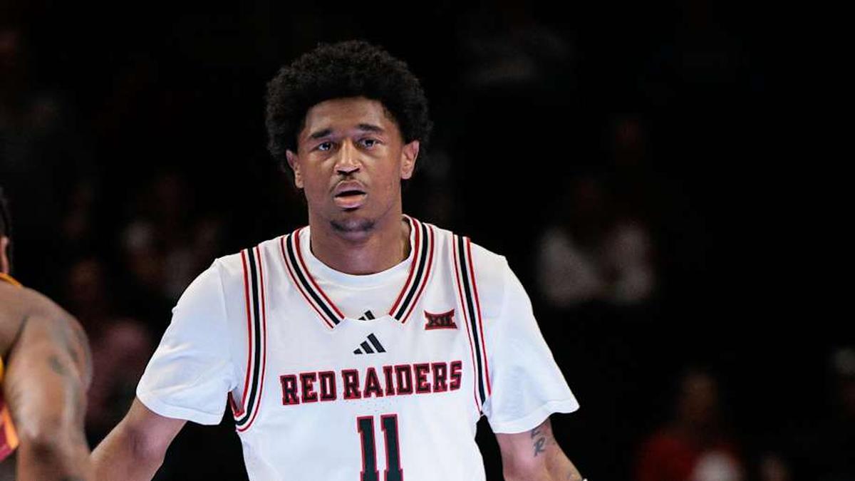  Mar 12, 2026; Kansas City, MO, USA; Texas Tech Red Raiders guard Jaylen Petty (11) brings the ball up court around Iowa State Cyclones guard Jamarion Batemon (1) during the first half at T-Mobile Center. Mandatory Credit: William Purnell-Imagn Images | William Purnell-Imagn Images 
