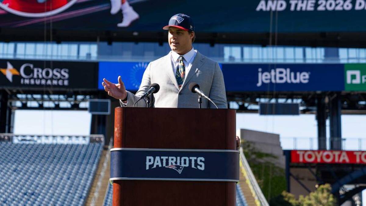  May 7, 2026; Foxborough, MA, USA; New England Patriots first round draft pick Caleb Lomu addresses the media during a press conference on the game field at Gillette Stadium. Mandatory Credit: Natalie Reid-Imagn Images | Natalie Reid-Imagn Images 