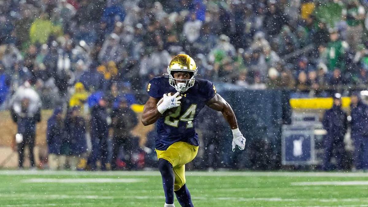  Nov 8, 2025; South Bend, Indiana, USA; Notre Dame Fighting Irish running back Jadarian Price (24) runs the ball against the Navy Midshipmen during the second half at Notre Dame Stadium. Mandatory Credit: Michael Caterina-Imagn Images | Michael Caterina-Imagn Images 