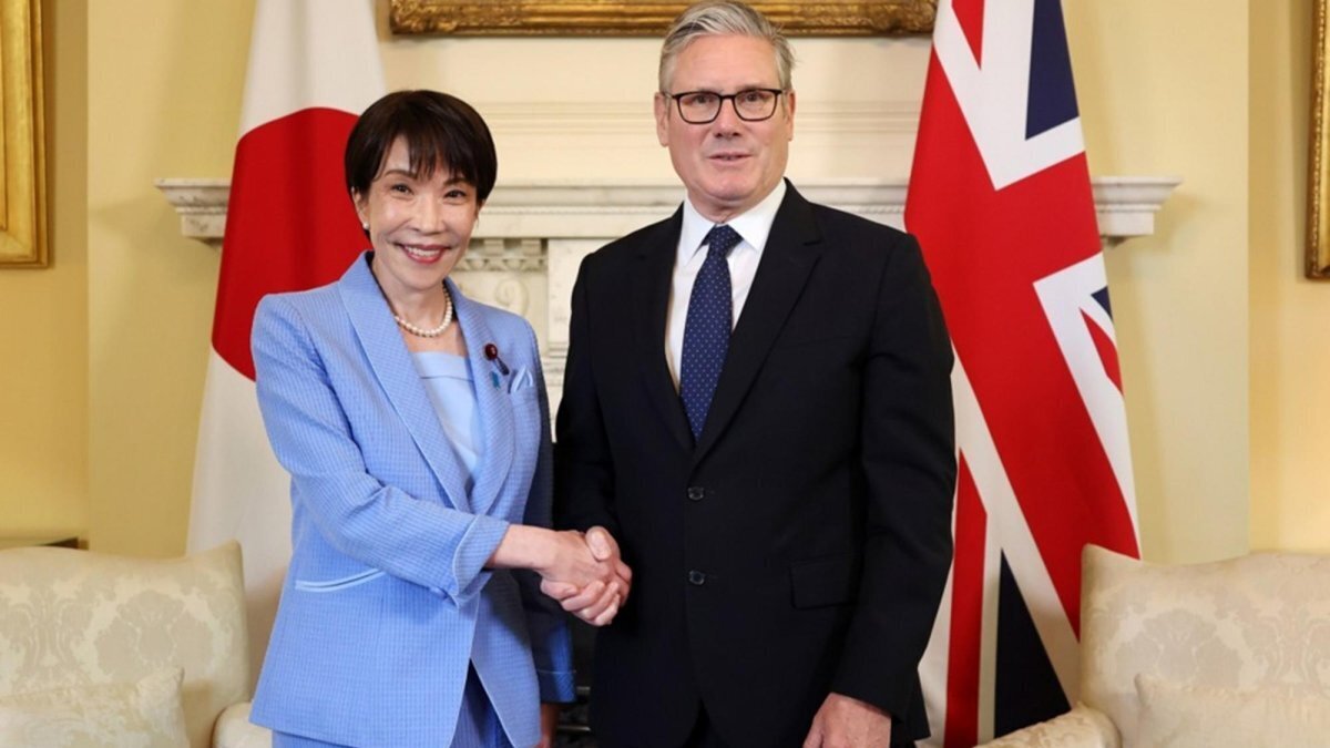 British Prime Minister Keir Starmer (R) shakes hands with Japanese Prime Minister Sanae Takaichi ahead of talks at 10 Downing Street in London, Britain, 14 June 2026. Photo by ANDY RAIN / EPA