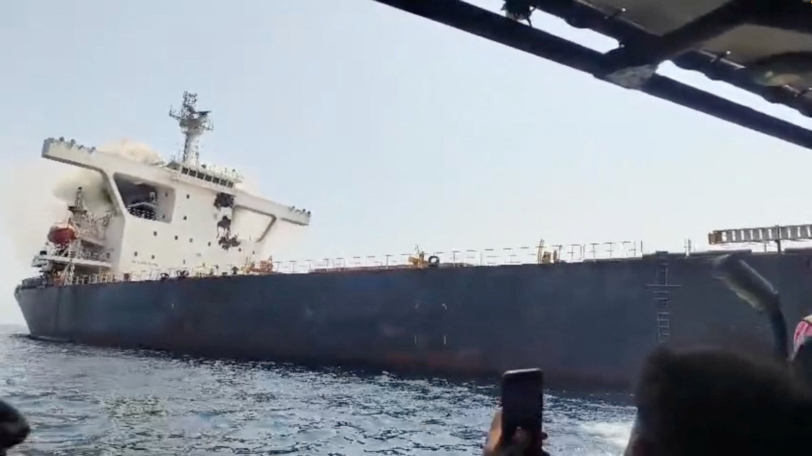 Two ships sink near Hormuz after being hit by projectiles amid surge in attacks 