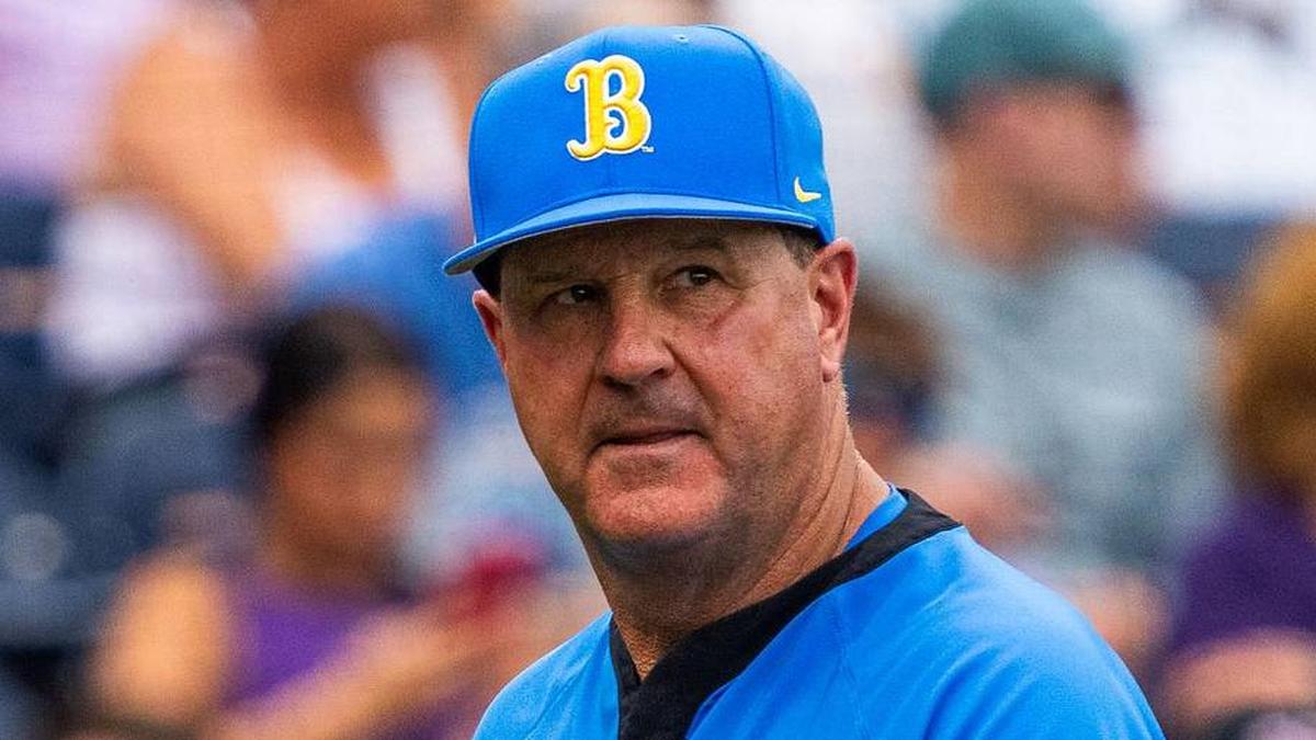  Jun 16, 2025; Omaha, Neb, USA; UCLA Bruins head coach John Savage walks off the field before the game against the LSU Tigers at Charles Schwab Field. Mandatory Credit: Dylan Widger-Imagn Images | Dylan Widger-Imagn Images 