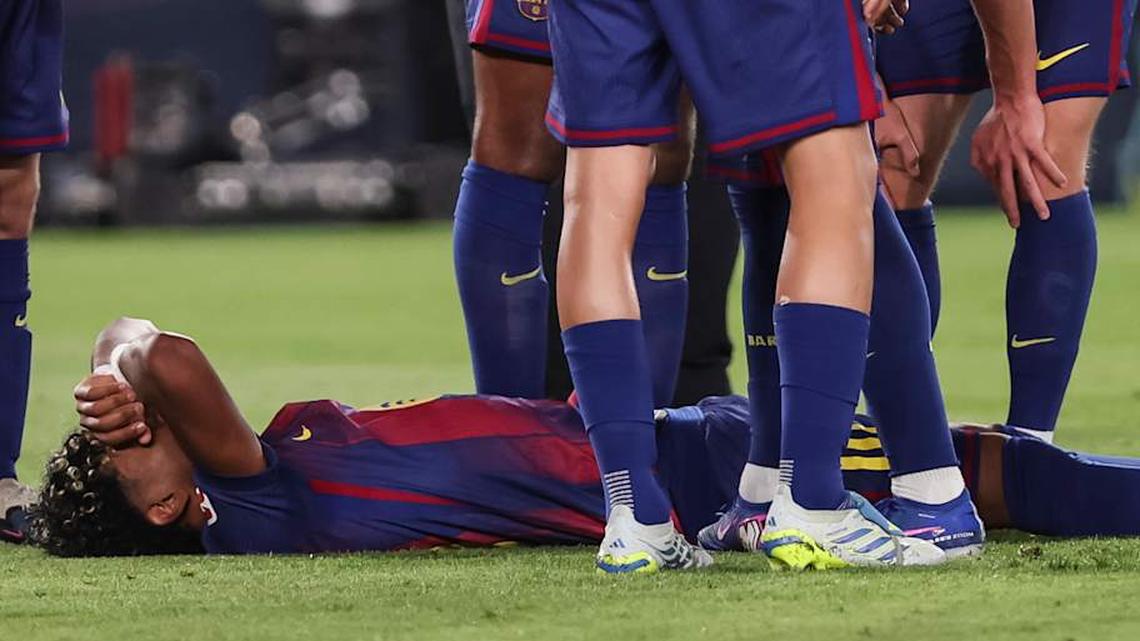  Lamine Yamal looked visibly concerned after sustaining an injury. | Javier Borrego/Europa Press/Getty Images 