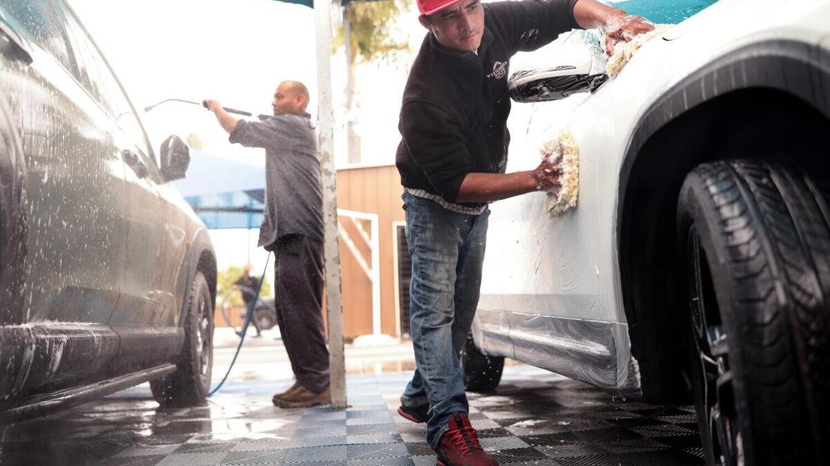 Workers wash cars at Westchester Hand Wash in Los Angeles on Thursday, June 4, 2026. (Christina House/Los Angeles Times/TNS)