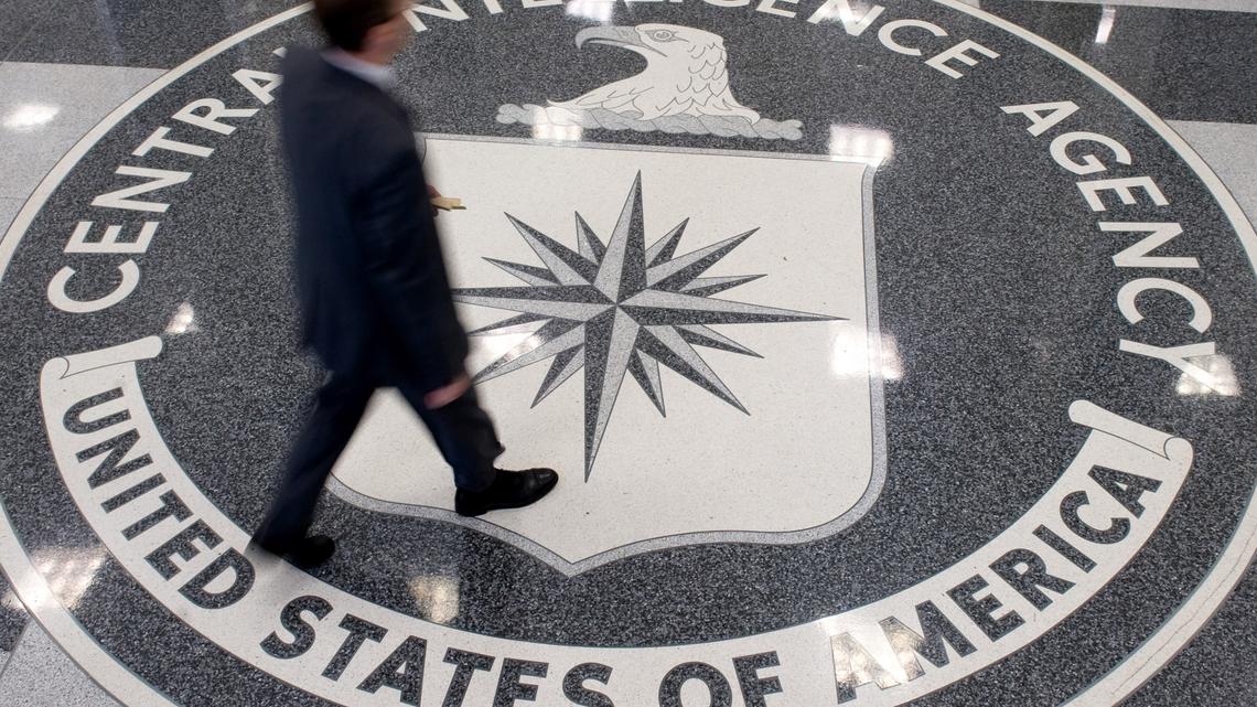 A man crosses the Central Intelligence Agency (CIA) seal in the lobby of CIA Headquarters in Langley, Virginia, on Aug. 14, 2008. Two U.S. agents said to be part of the CIA who died after an operation to dismantle a suspected Mexican narcotics laboratory had no permission to be carrying out operations of this kind, according to the nation’s security Cabinet. (Saul Loeb/AFP/Getty Images/TNS)