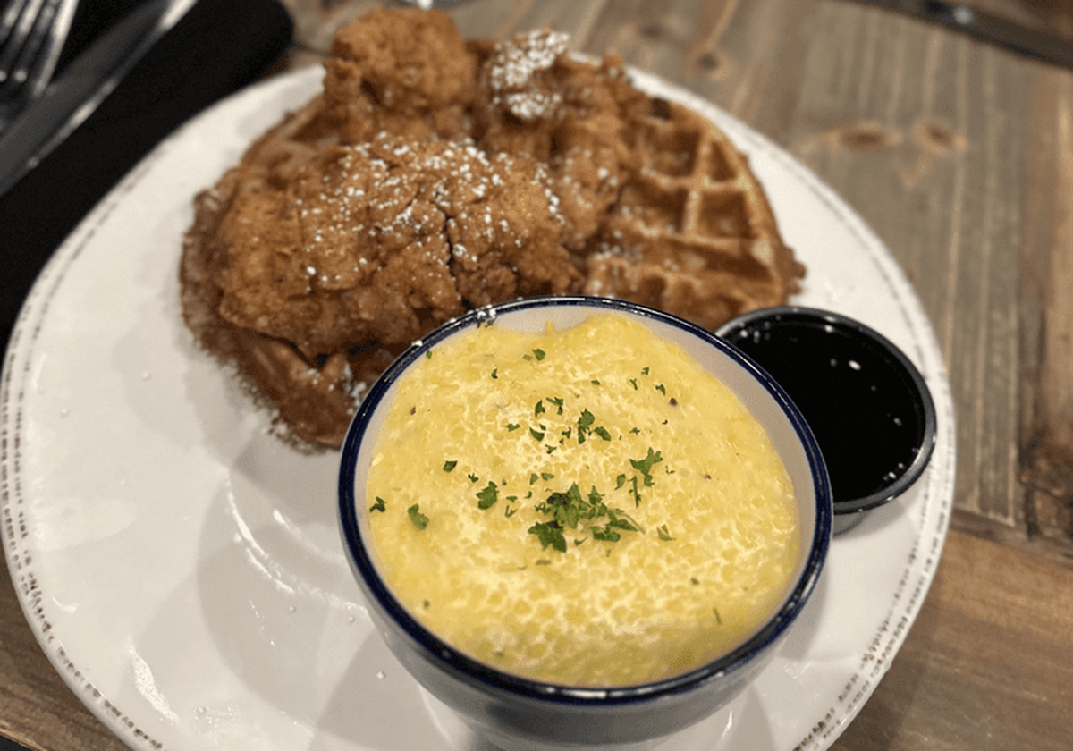  Fried chicken, a golden waffle, and a side of cheese grits. Photo credit: Cherith Glover Fluker 