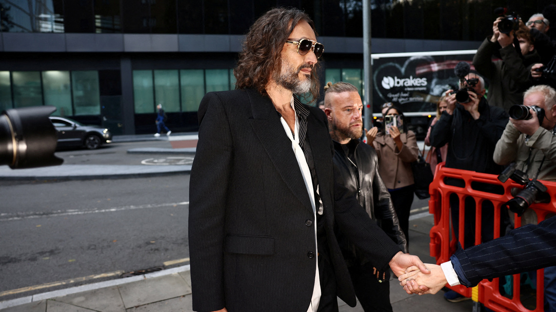 UK comedian Russell Brand's accuser tells jurors: 'I know he raped me'