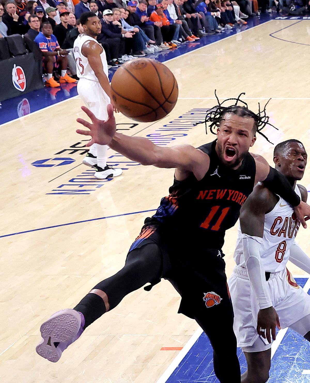 May 21, 2026; New York, New York, USA; New York Knicks guard Jalen Brunson (11) fights for a rebound against Cleveland Cavaliers guard Dennis Schroder (8) during the fourth quarter of game two of the eastern conference finals during the 2026 NBA playoffs at Madison Square Garden. Mandatory Credit: Brad Penner-Imagn Images