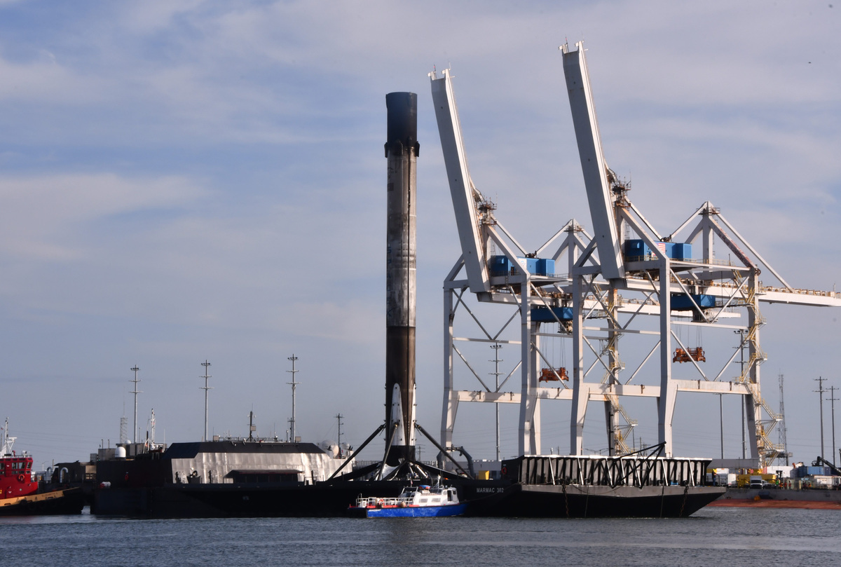 A SpaceX Falcon 9 first-stage booster arrives at Port Canaveral in August 2021 on the SpaceX drone ship A Shortfall of Gravitas.