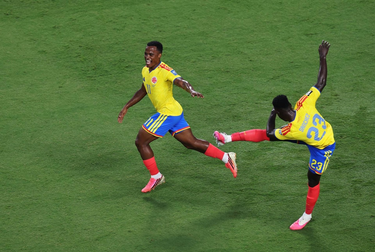  Jhon Arias #11 of Colombia celebrates with Davinson Sanchez #23 after scoring the team's first goal during the FIFA World Cup 2026 Round of 32 match between Colombia and Ghana at Kansas City Stadium on July 03, 2026 in Kansas City, Missouri. (Photo by Carl Recine/Getty Images) Photo by Carl Recine/Getty Images