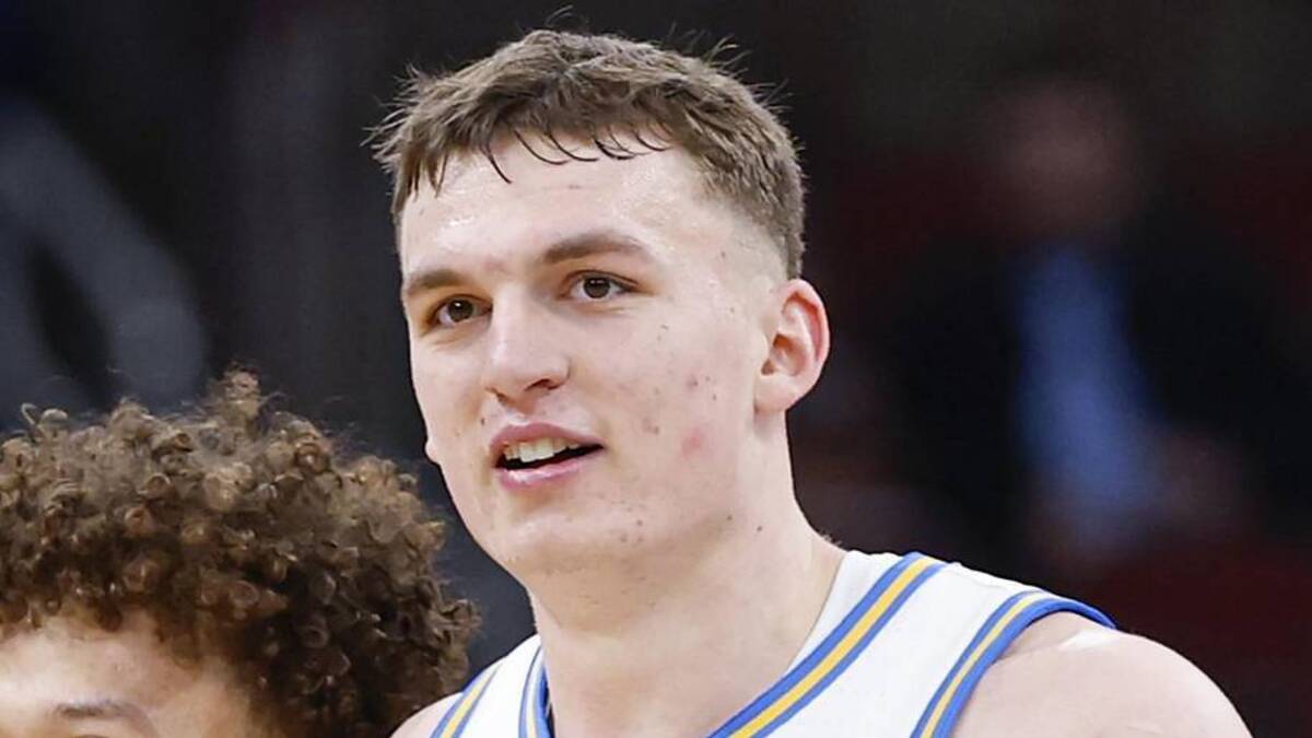  Mar 12, 2026; Chicago, IL, USA; UCLA Bruins guard Trent Perry (0) and forward Tyler Bilodeau (34) smile during the second half at United Center. Mandatory Credit: Kamil Krzaczynski-Imagn Images | Kamil Krzaczynski-Imagn Images 