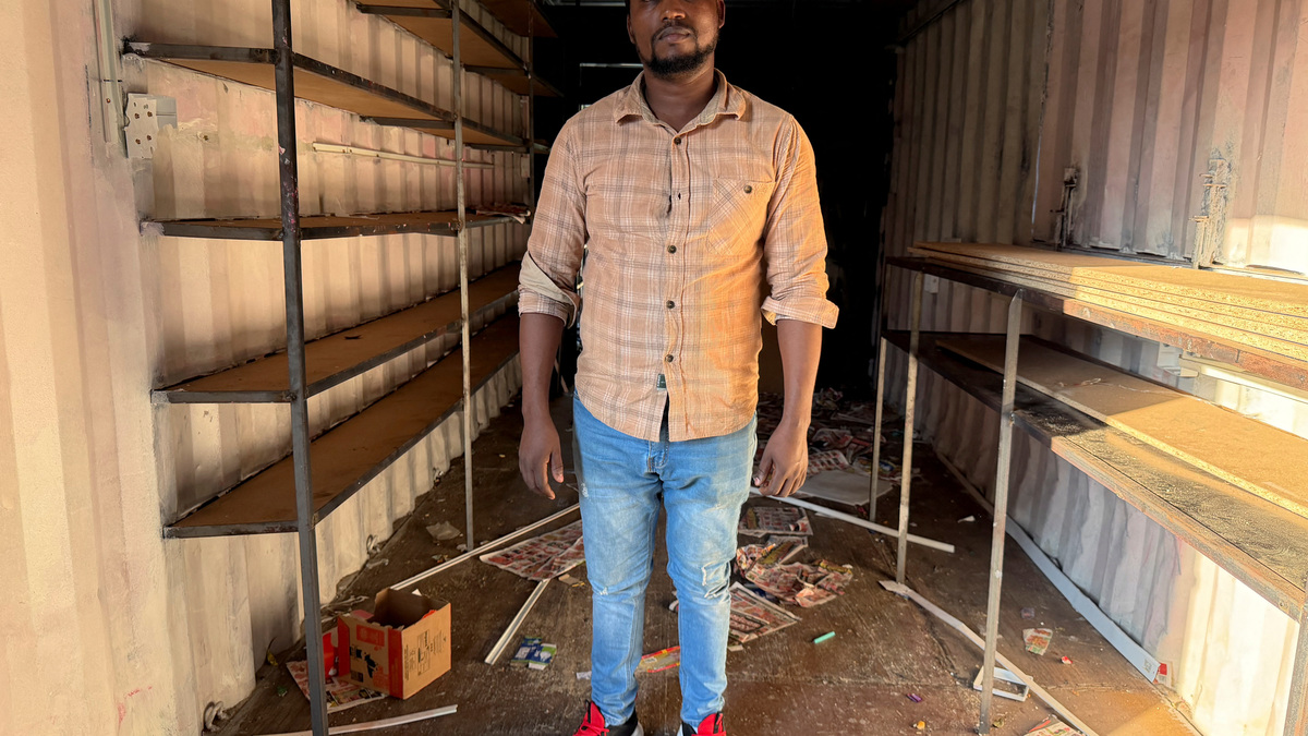 Ethiopian refugee Daniel Abide poses for a photo at his looted shop after xenophobic protests in kwaDabeka, Durban, South Africa, July 1, 2026. REUTERS/Siyabonga Sishi