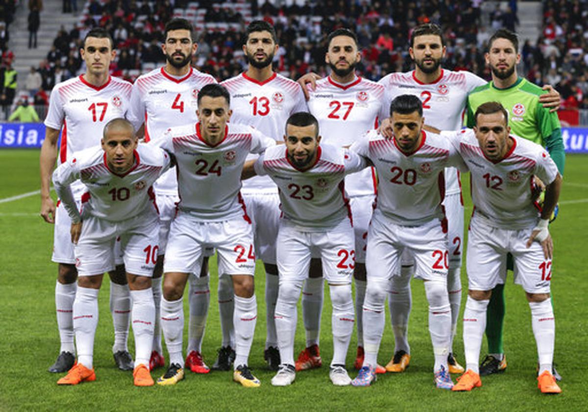 In this photo taken on Tuesday, March 27, 2018, Tunisia's national soccer team poses before a friendly soccer match between Tunisia and Costa Rica at the Allianz Riviera stadium in Nice, southern France.