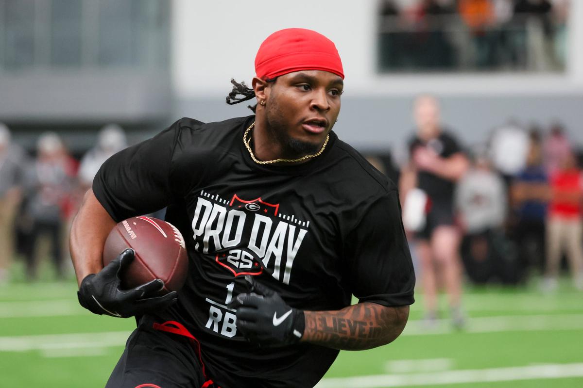 Georgia running back Trevor Etienne runs a drill during the schools NFL Pro Day at the University of Georgia Indoor Practice Facility, Wednesday, March, 12, 2025, in Athens, Ga. (Jason Getz / AJC)