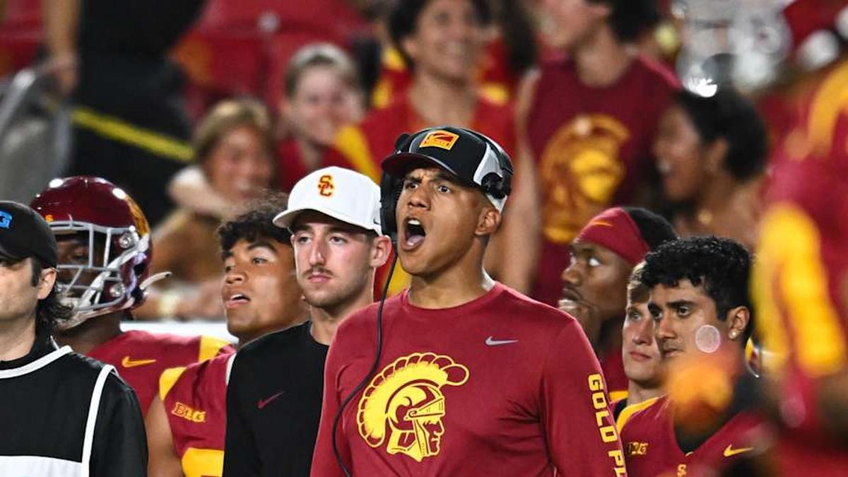  Sep 7, 2024; Los Angeles, California, USA; USC Trojans defensive coordinator D'Anton Lynn reacts against the Utah State Aggies during the fourth quarter at United Airlines Field at Los Angeles Memorial Coliseum. | Jonathan Hui-Imagn Images 