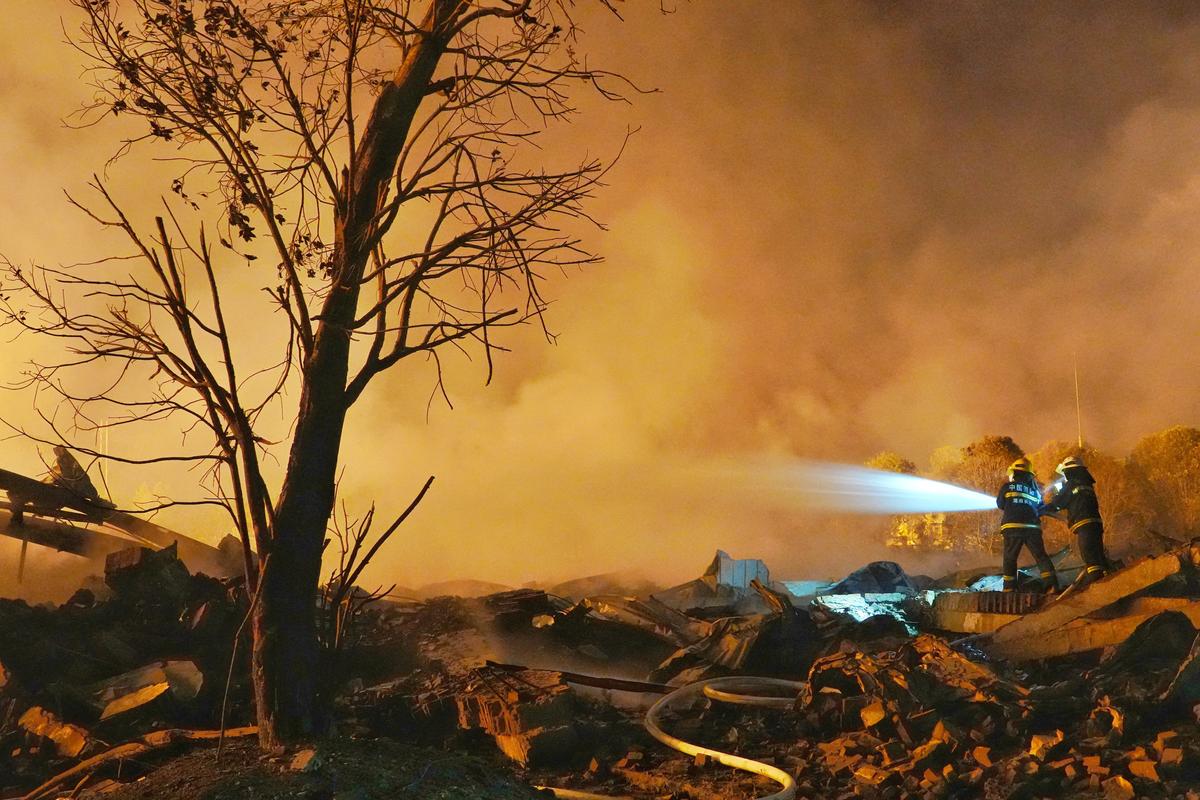 Firefighters work to extinguish a fire following a blast at a fireworks manufacturing factory in Liuyang, Hunan province, China, May 5, 2026. cnsphoto via REUTERS