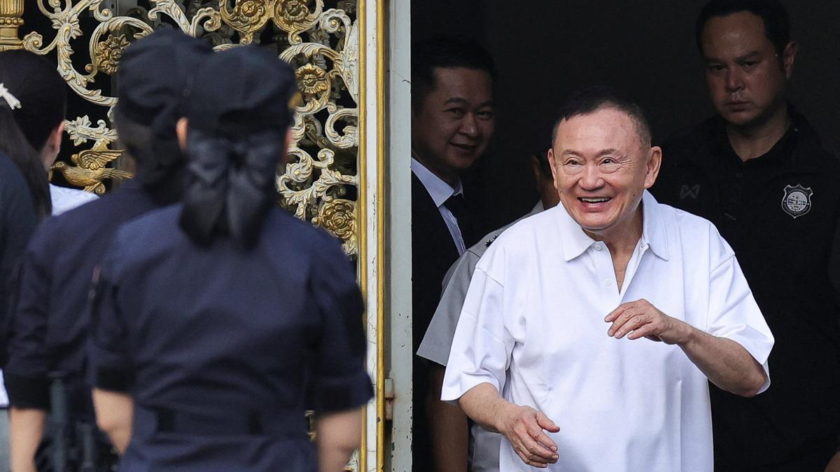 Former Thai Prime Minister Thaksin Shinawatra reacts following his release on parole after serving eight months of his one-year sentence at Klong Prem Central Prison, in Bangkok, Thailand, May 11, 2026. REUTERS/Athit Perawongmetha
