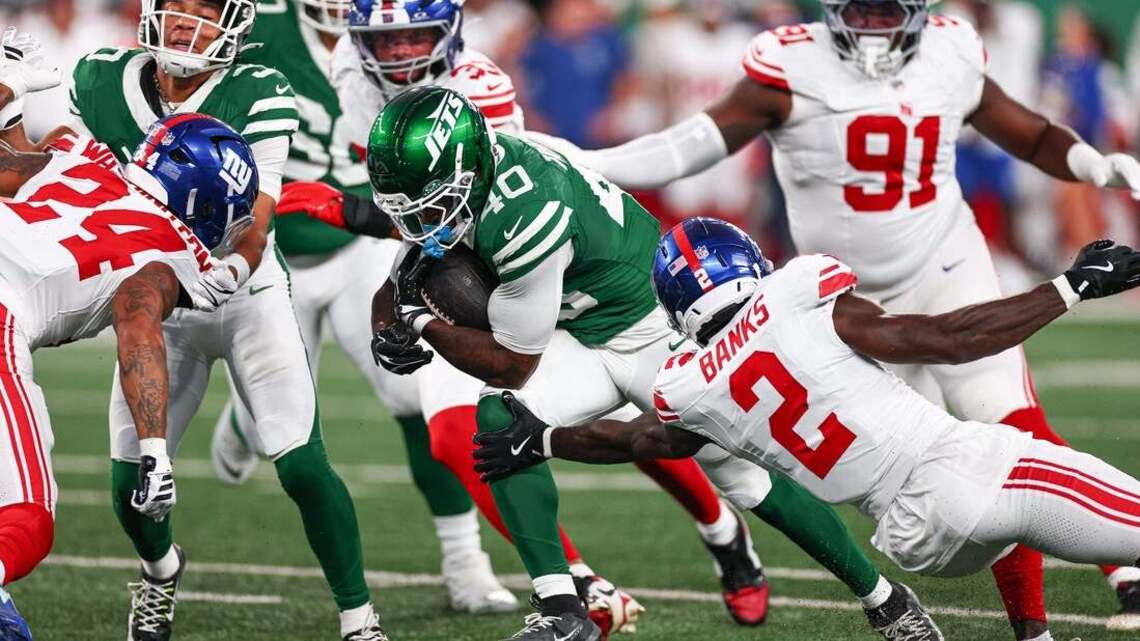 Jets rookie RB Chip Trayanum taken to hospital with neck injury 