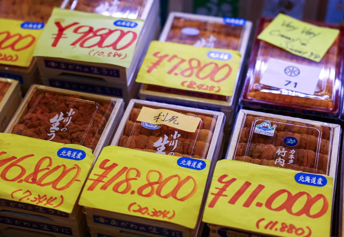 Sea urchins from various regions of Hokkaido including from Rishiri Island are displayed with their price tags in a showcase of a wholesaler at Tsukiji Outer Market in Tokyo, Japan August 22, 2025.  REUTERS/Issei Kato