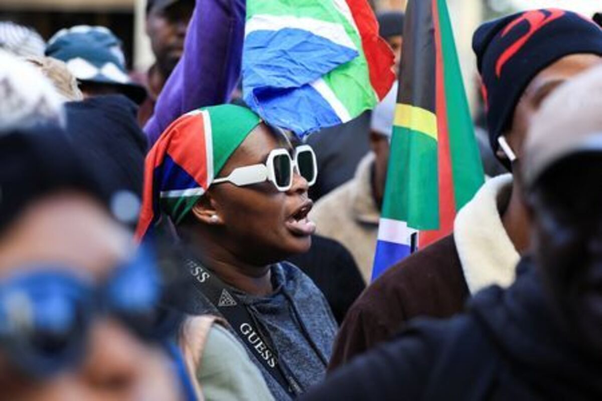 An anti-immigrant protester during a march on the day of an unofficial deadline set by anti-immigrant groups for all undocumented migrants to leave, in Cape Town, South Africa, June 30, 2026. REUTERS/Esa Alexander