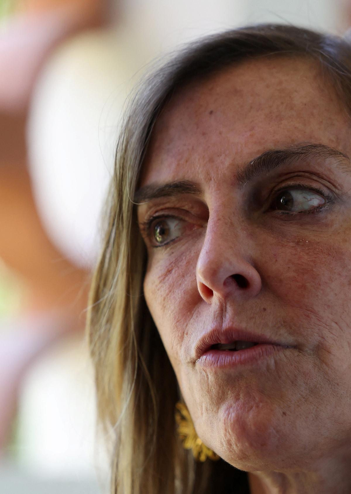 Tatiana Sampaio, a scientist and professor at the Federal University of Rio de Janeiro, speaks during an interview with Reuters, in her house in Rio de Janeiro, Brazil March 27, 2026. REUTERS/Pilar Olivares