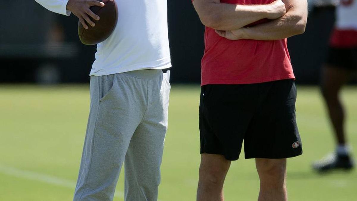  Jun 10, 2025; Santa Clara, CA, USA; San Francisco 49ers head coach Kyle Shanahan (left) and general manager John Lynch watch their team work out during an OTA at Levi's Stadium. Mandatory Credit: D. Ross Cameron-Imagn Images | D. Ross Cameron-Imagn Images 